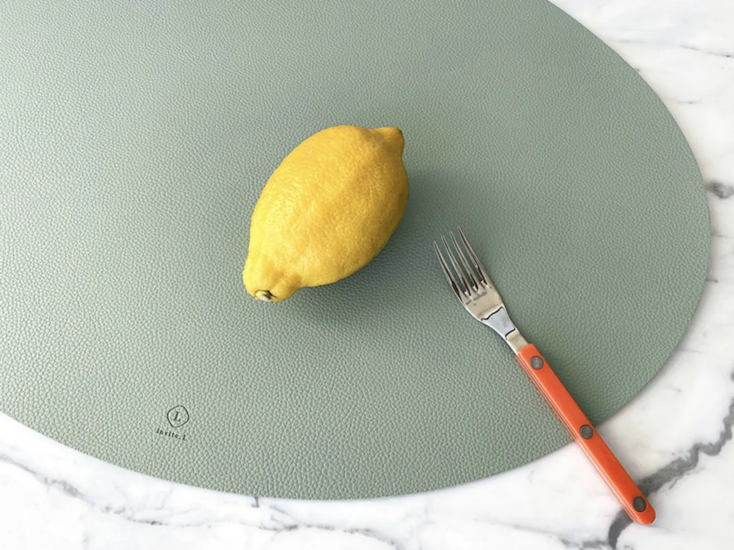 Ellipse Edge Leather Dining Placemat